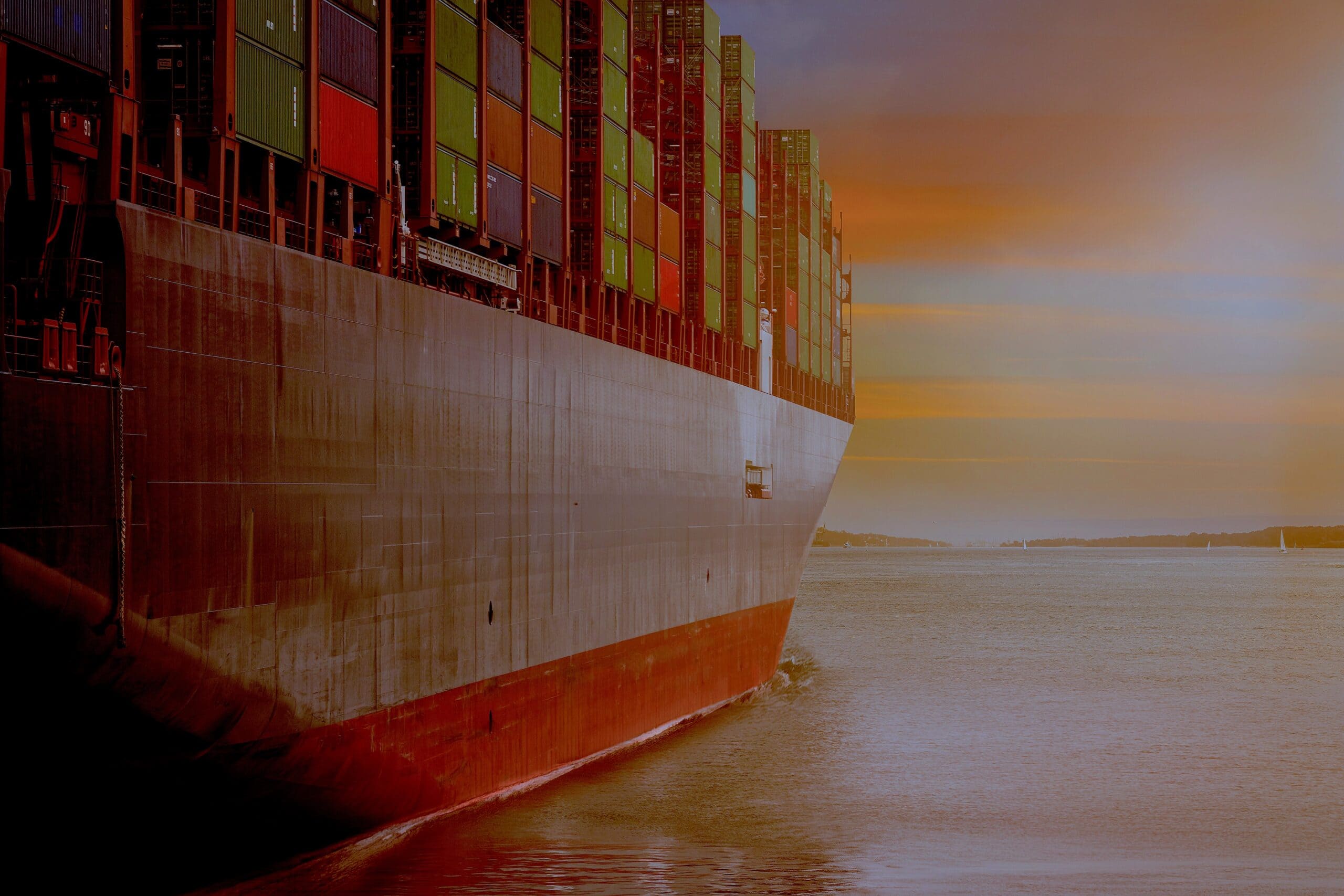 A container ship being loaded at a terminal, with a world map and logistics icon overlay